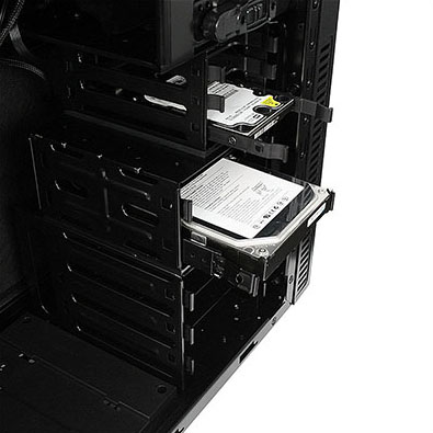 Computer hard drive half inside a desktop tower